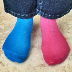 My stepdaughter's socks are channeling Flickr's logo colors