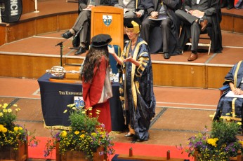 Receiving her Ph.D. diploma
