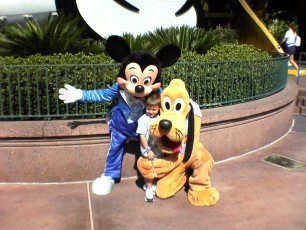 Davis (Chris' son) with Mickey and Pluto
