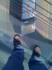 Standing on a glass bridge