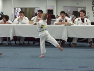 Demonstrating kicks to the front, sides, and back