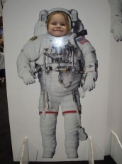 Karis tries on a space suit (stoopid flash reflection)