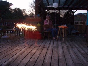 Trying to shoot Karis walking all the way across the deck, but my little pocket camera can't really be set to leave the shutter open longer