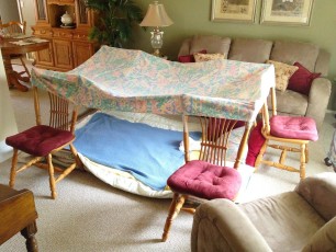 The girls slept over at grandma's house and built themselves a tent
