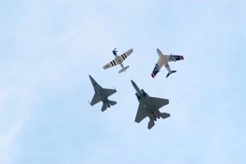 Diamond formation flight by F-15, F-16, F-86 Sabre, and P-51 Mustang