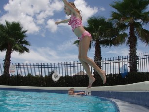 Ashlyn, the more graceful of the two, took to some more traditional dives