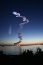 STS-131 Space Shuttle Discovery post-launch smoke drifts