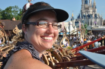 Lori on the Dumbo ride—nice capture with the castle in the background