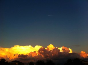 September 11 sunset illuminating eastern clouds