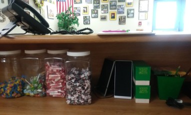 I manned the desk in the dean's office and found that there have been hidden stashes of candy right under our noses!