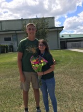 This tall dude, Kevin, asked my friend, Greta, to homecoming (she really likes him) and so, of course, she said yes—they're so cute together!