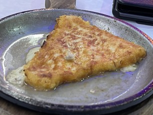 Saganaki—flamed cheese