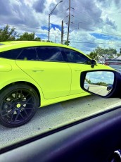 Photos simply had no prayer of depicting just how insanely vibrant a shade of chartreuse adorned this car