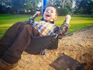 Mason's first time on the big kid swing